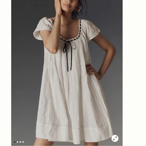 Anthropologie Tie mini swing dress white dress with Black bow